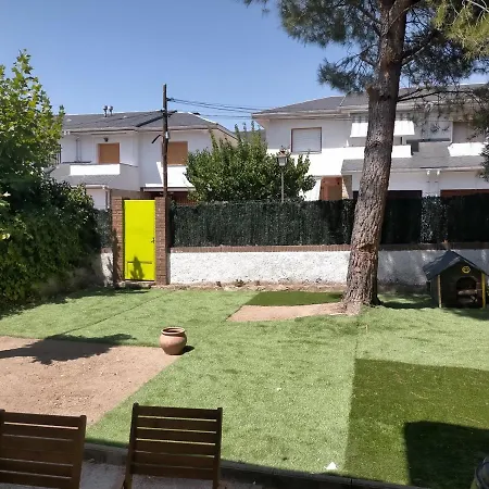 Chalet Adosado Con Jardin Holiday home *